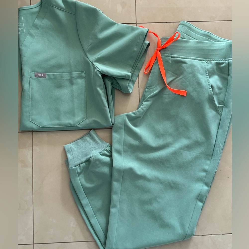 Green Scrub Set with Orange Accents